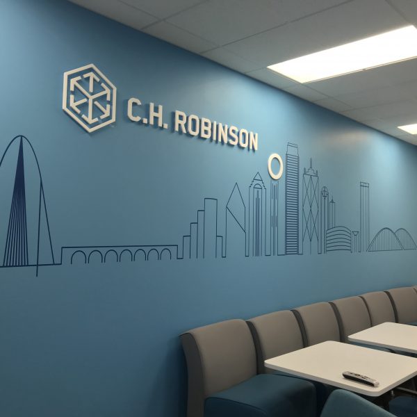 Wall mural with acrylic logo signs